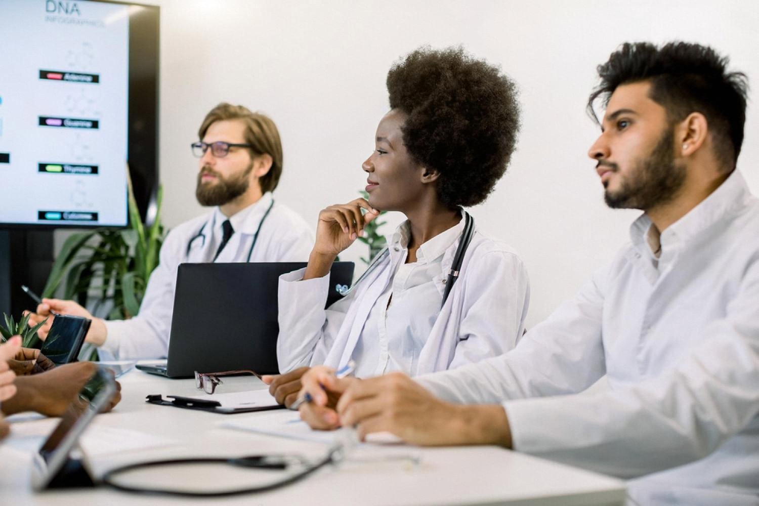 Group of medical students studying with laptops during exam preparation